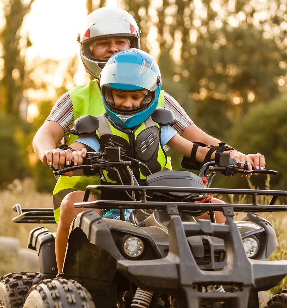 parent and child riding OHV
