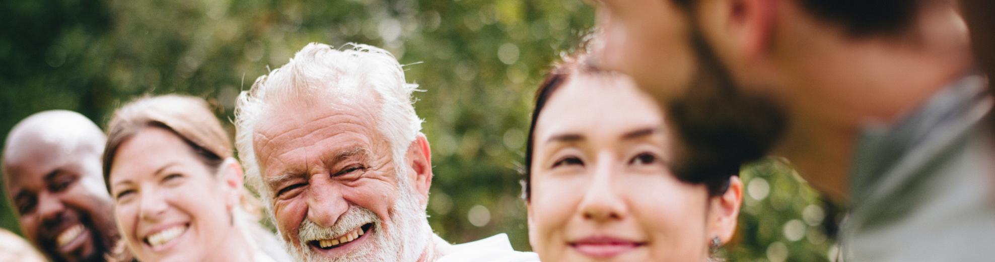 Closeup of smiling people's faces in Lyon County